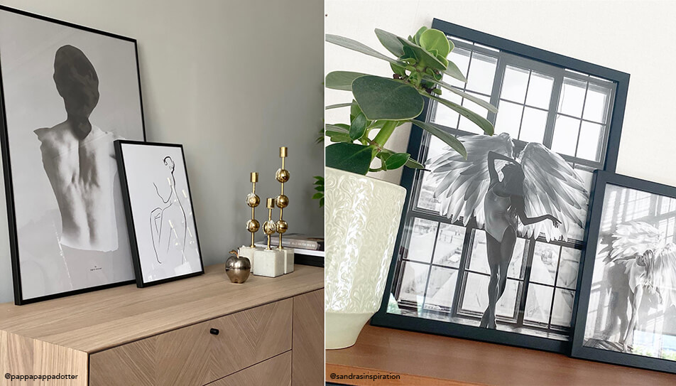 Черно-бели картини поставени на комод