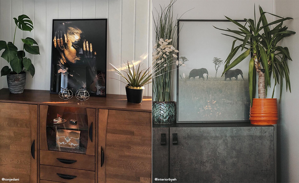 Картини и растения поставени на комод